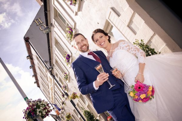 Bride and Groom outside hotel